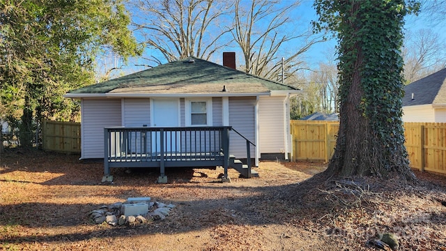 view of front of home featuring a wooden deck