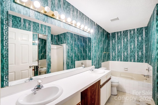 full bathroom featuring tile patterned flooring, vanity, toilet, and shower with separate bathtub