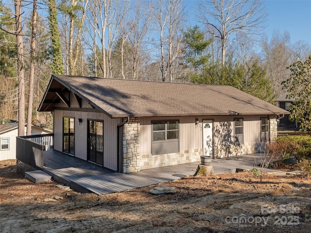 view of front of house featuring a wooden deck