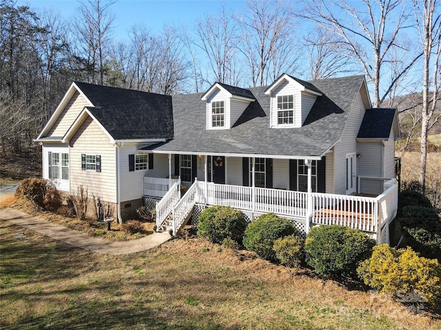 cape cod home with crawl space, covered porch, a shingled roof, and a front lawn