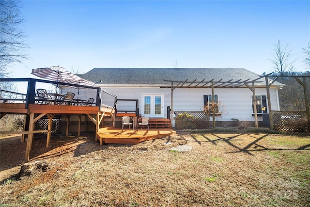 back of house featuring a wooden deck, a shingled roof, a pergola, and french doors