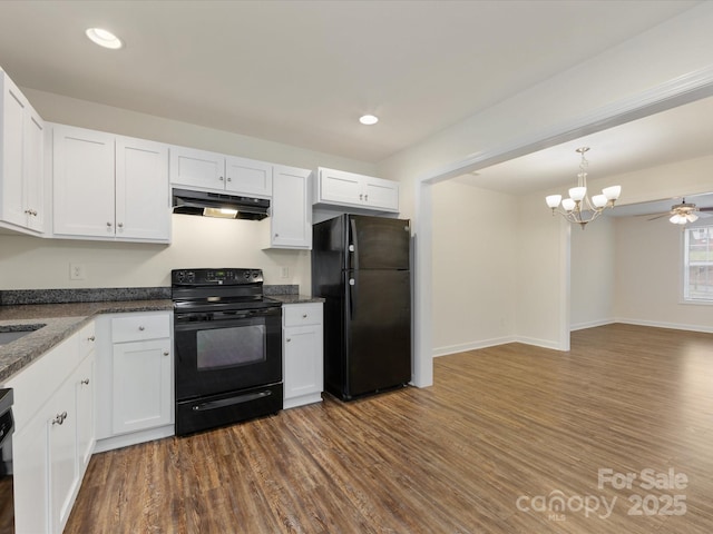 kitchen with dark wood-type flooring, white cabinets, and black appliances