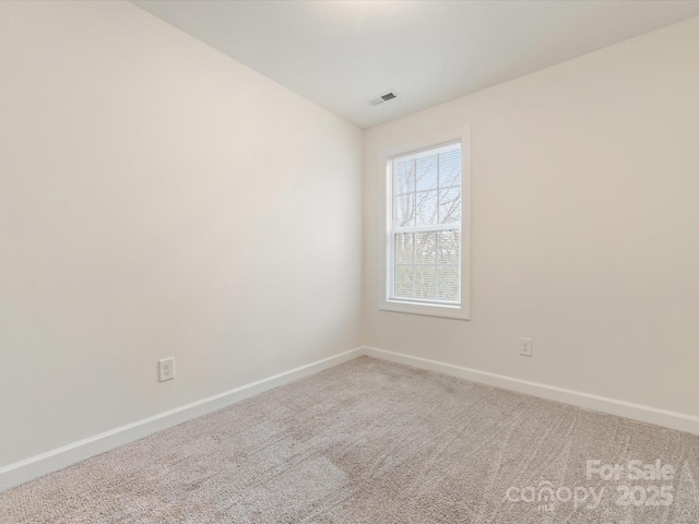 view of carpeted spare room