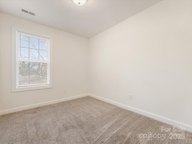 view of carpeted spare room