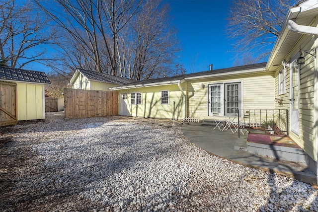 rear view of house featuring a patio