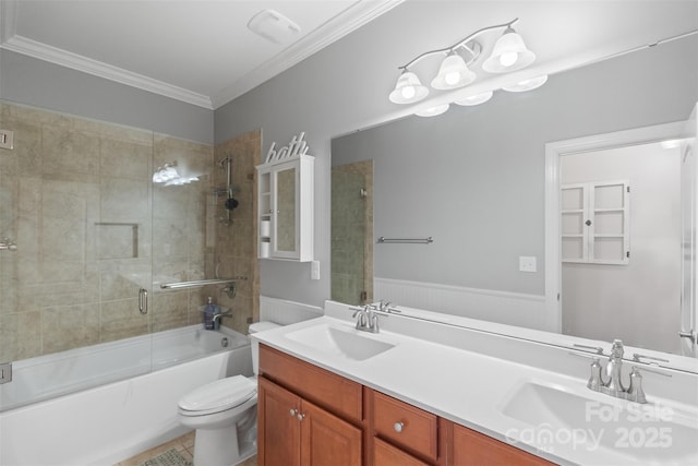 full bathroom with shower / bath combination with glass door, vanity, ornamental molding, and toilet