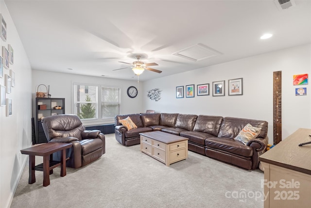 living room with ceiling fan and light carpet