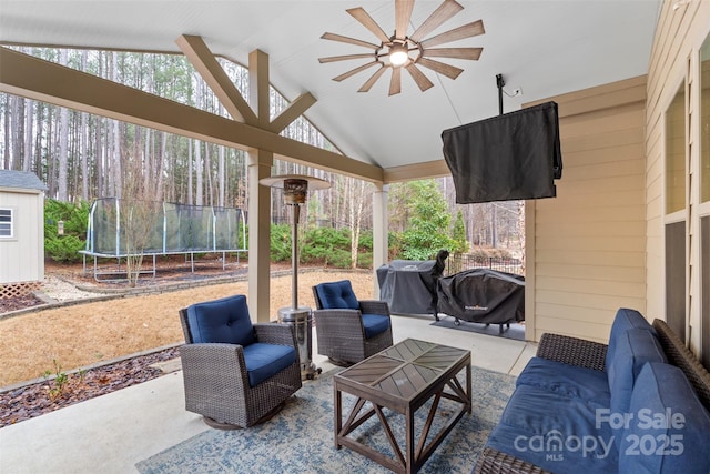 view of patio / terrace featuring ceiling fan, a trampoline, grilling area, and an outdoor hangout area