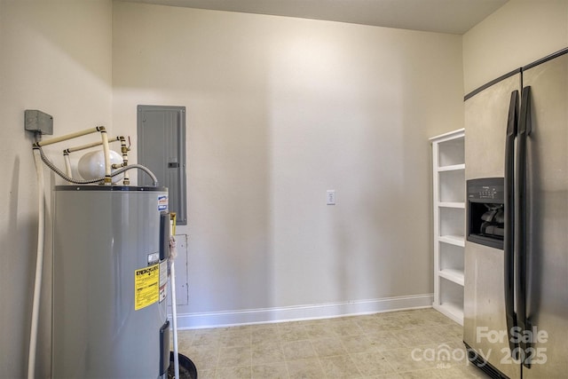 utility room featuring electric panel and water heater