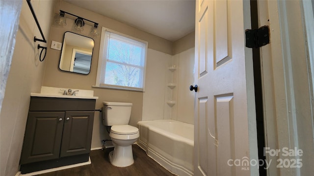 full bathroom with toilet, vanity, shower / bath combination, and hardwood / wood-style flooring