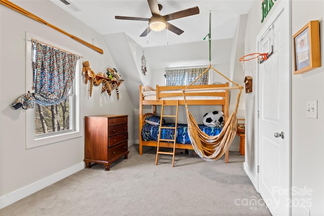 bedroom featuring ceiling fan and light colored carpet