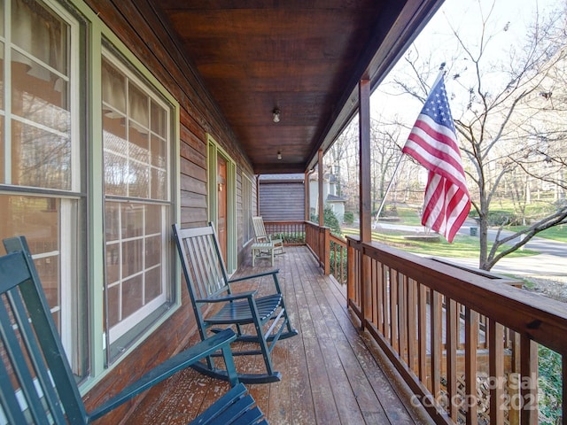 deck featuring covered porch