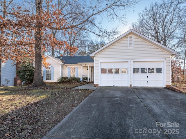 ranch-style home with a garage