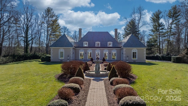 view of front of house with a front yard