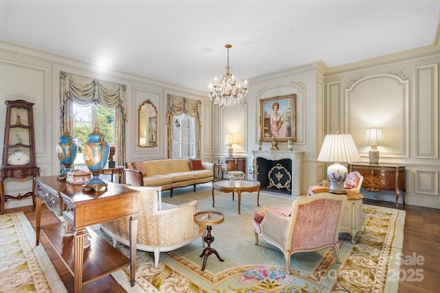 sitting room with ornamental molding, parquet flooring, and a notable chandelier