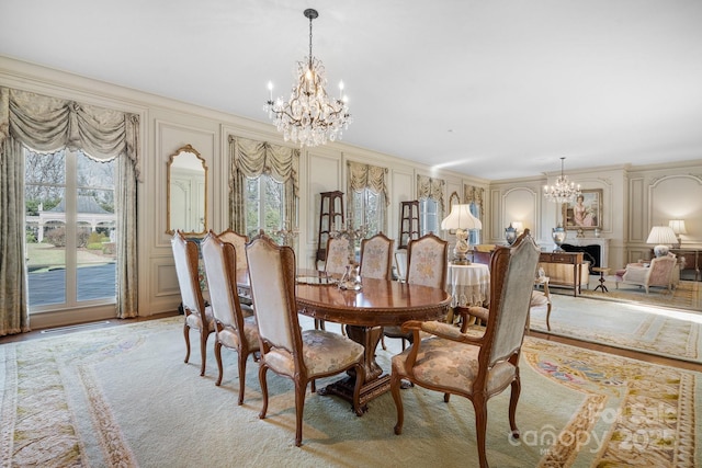 dining room featuring crown molding and a chandelier