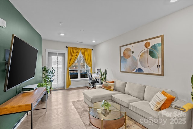 living room featuring light hardwood / wood-style floors