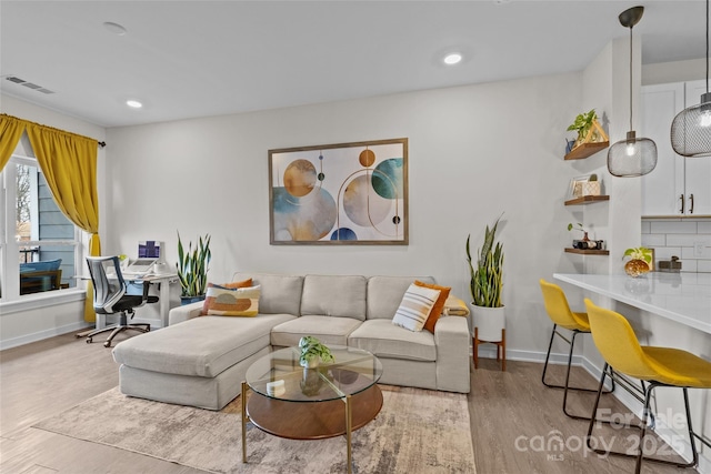 living room featuring light hardwood / wood-style floors