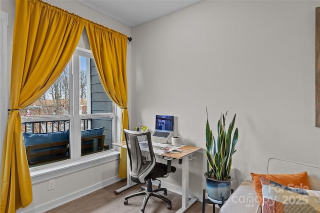 office with hardwood / wood-style flooring