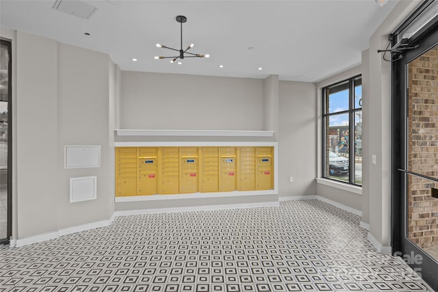 interior space with a chandelier and mail boxes