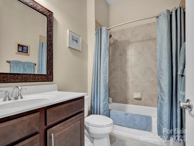 full bathroom featuring toilet, shower / tub combo, and vanity