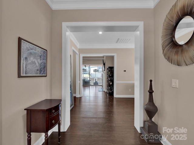 hall featuring dark hardwood / wood-style flooring and crown molding