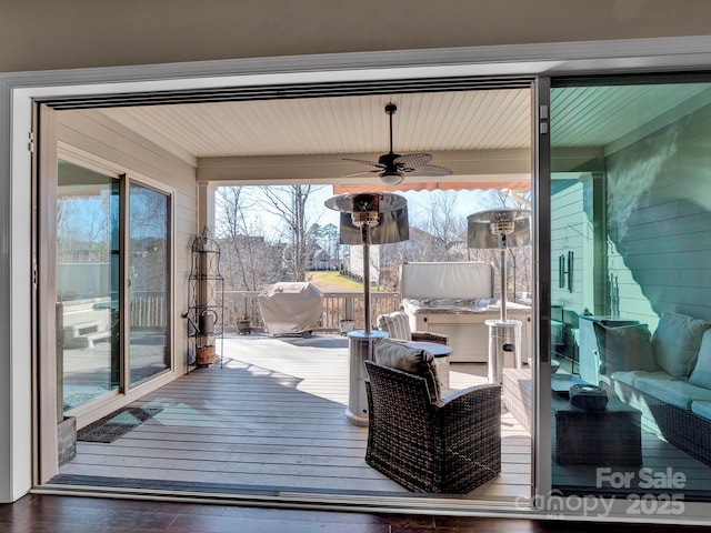 wooden terrace with ceiling fan