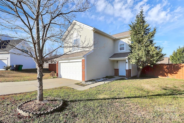 front of property featuring a front lawn and a garage