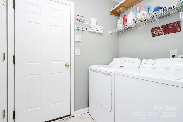 laundry room with washer and dryer