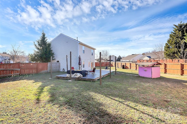 view of yard featuring a wooden deck