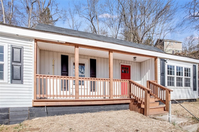 doorway to property featuring a porch