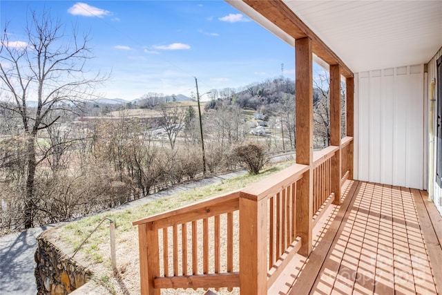 wooden terrace featuring a mountain view