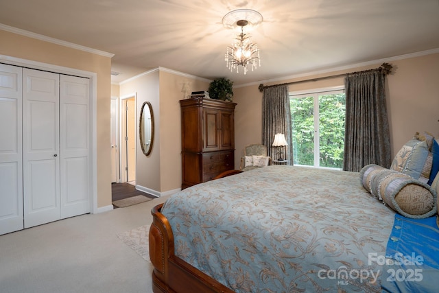 bedroom with a closet, ornamental molding, light colored carpet, and an inviting chandelier