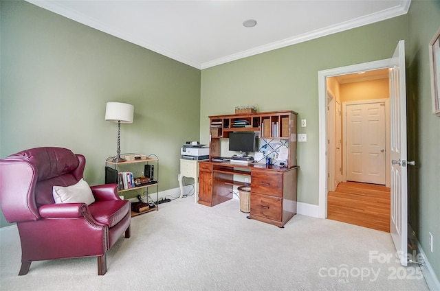 carpeted office space with ornamental molding