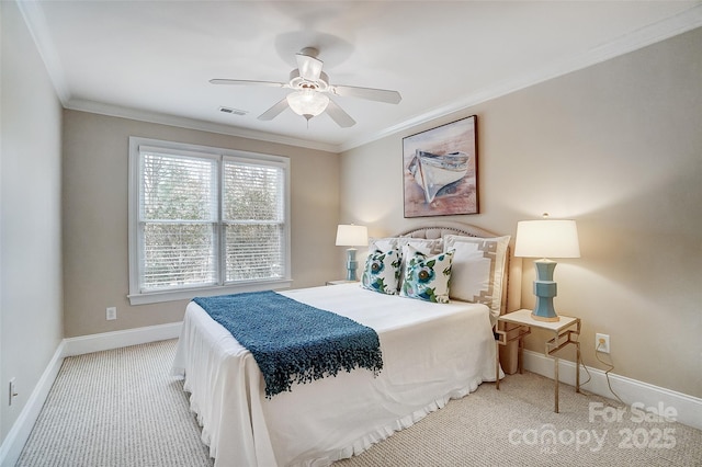 carpeted bedroom featuring ornamental molding and ceiling fan