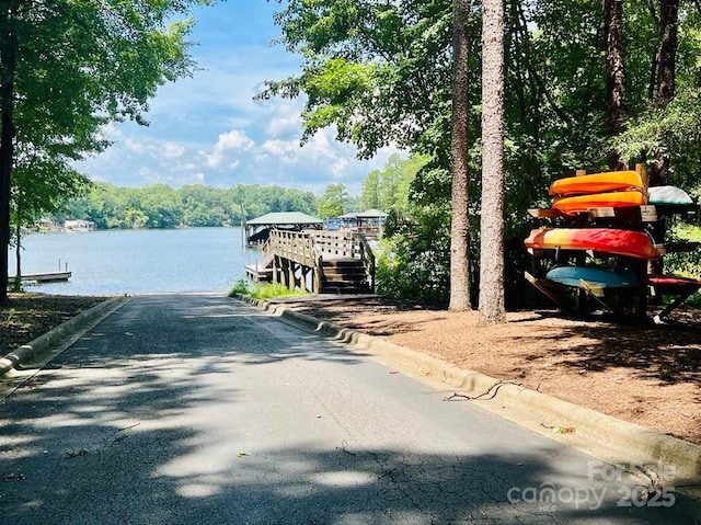 exterior space with a water view