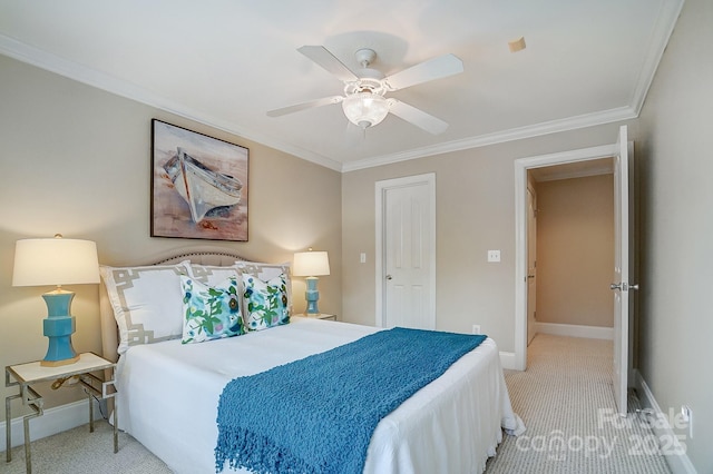 carpeted bedroom with crown molding and ceiling fan