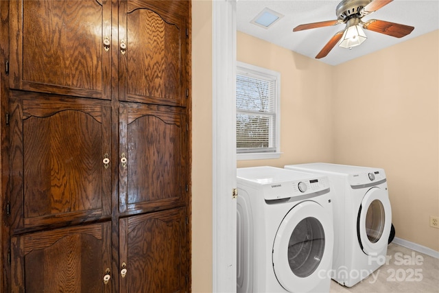 laundry room featuring ceiling fan, cabinets, and separate washer and dryer