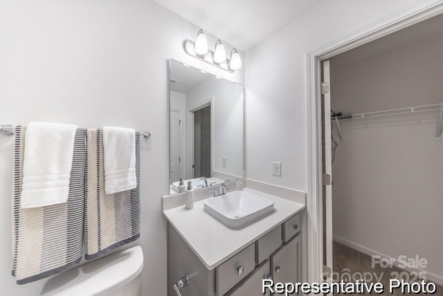 205 Cliffwood St NW Unit Unitb-2, Concord, NC 28027 - bathroom featuring vanity and a walk in closet