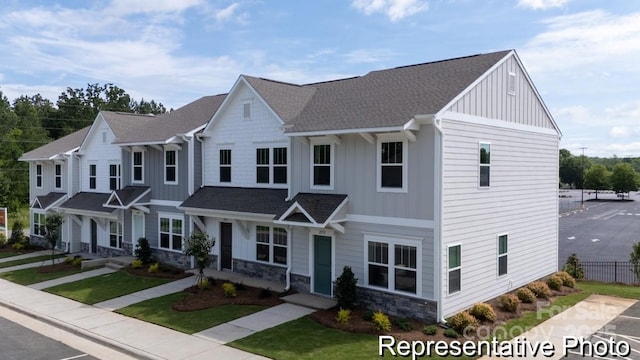 205 Cliffwood St NW Unit Unitb-2, Concord, NC 28027 - view of front of home with board and batten siding, stone siding, and roof with shingles