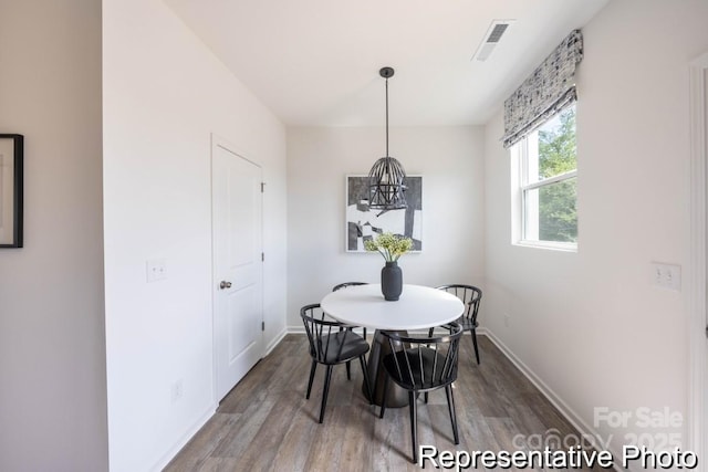 205 Cliffwood St NW Unit Unitb-2, Concord, NC 28027 - dining room with wood finished floors and a chandelier