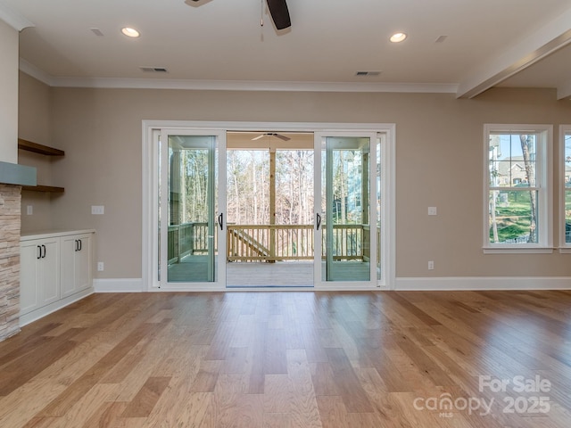 interior space featuring ornamental molding, recessed lighting, visible vents, and light wood-style floors