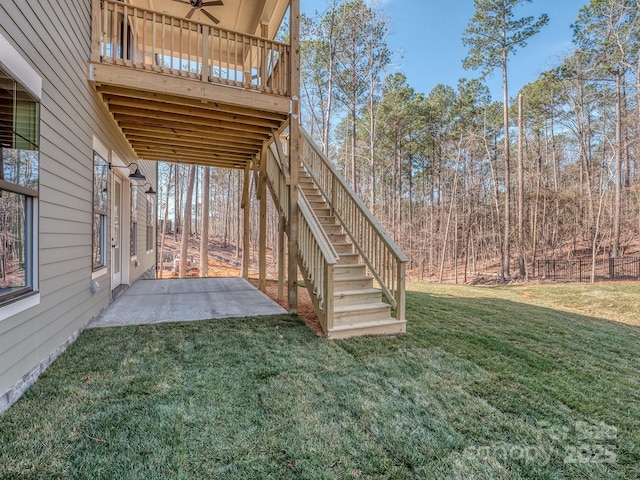 view of yard featuring stairs and a patio area