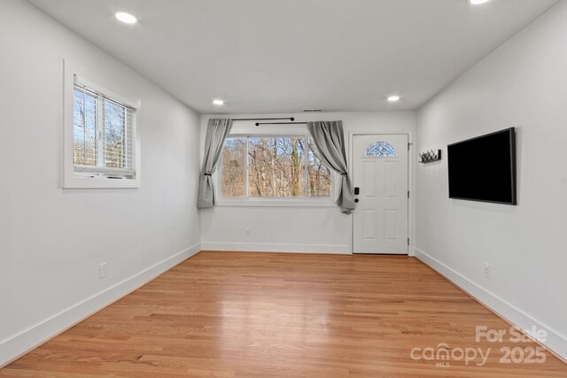 453 Riverview Dr, Asheville, NC 28806 - foyer entrance featuring light hardwood / wood-style flooring