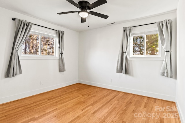 453 Riverview Dr, Asheville, NC 28806 - unfurnished room featuring hardwood / wood-style flooring and ceiling fan