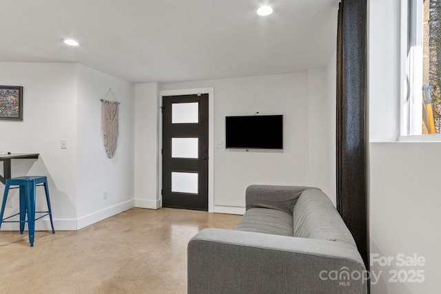 453 Riverview Dr, Asheville, NC 28806 - living room featuring a wealth of natural light and concrete floors