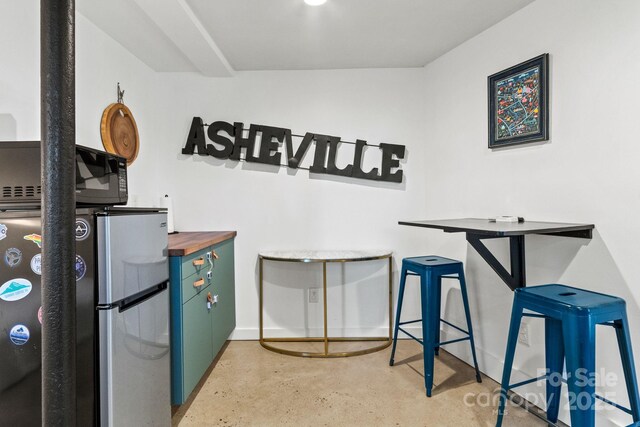 453 Riverview Dr, Asheville, NC 28806 - bar featuring stainless steel refrigerator and wood counters