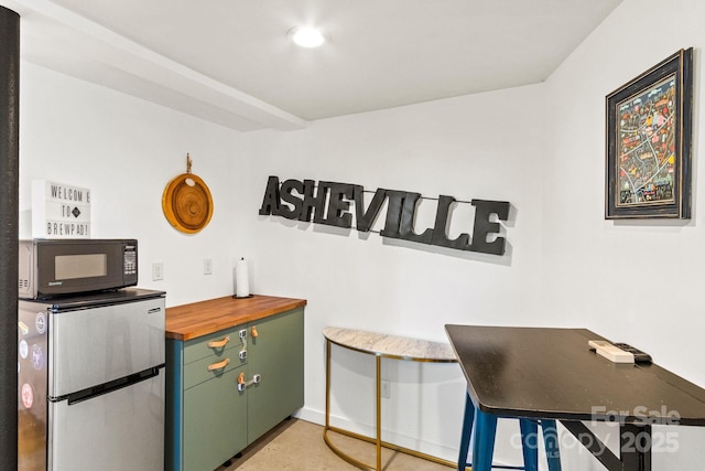 453 Riverview Dr, Asheville, NC 28806 - interior space with stainless steel fridge