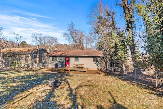 453 Riverview Dr, Asheville, NC 28806 - rear view of house with a fire pit and a lawn