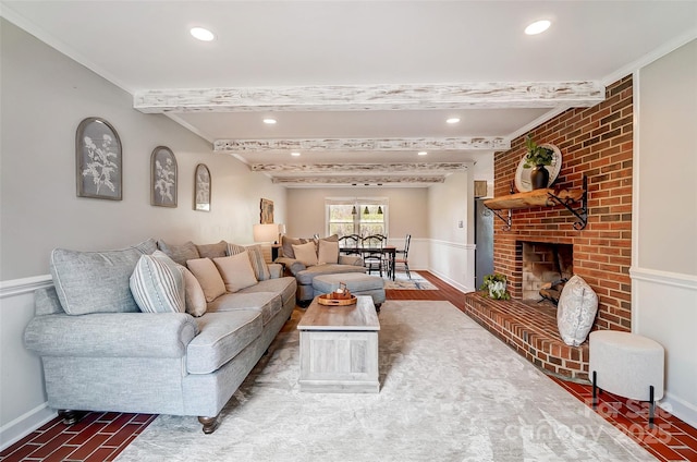 living area with a brick fireplace, beamed ceiling, recessed lighting, and baseboards